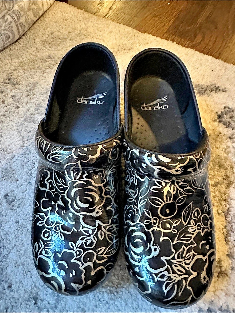 Dansko XP 2.0 Black Floral Tooled Clogs